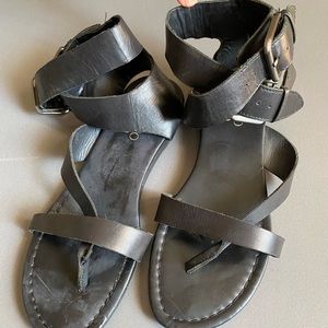 Black leather sandals by Franco Sarto